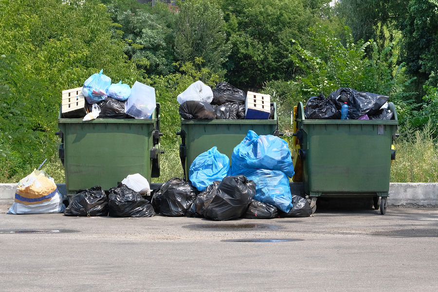Dumpsters Being Full With Garbage. Garbage Is Pile Lots Dump. Ga Dumpsters being full with garbage. Garbage is pile lots dump. Garbage waste lots junk dump.